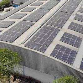 Top view image of the solar panels of Teppattana Papr Mill Co Ldt building in Thailand. 